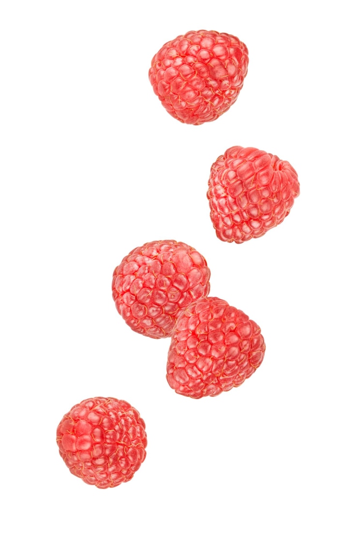 PSD levitation of ripe natural raspberry berries isolated on a white background