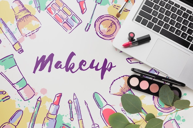 PSD lipstick and makeup palette on table