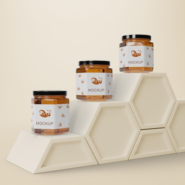 liquid honey in jars on table