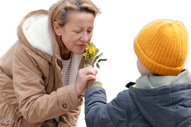 PSD little boy spending time outdoors with his grandmother