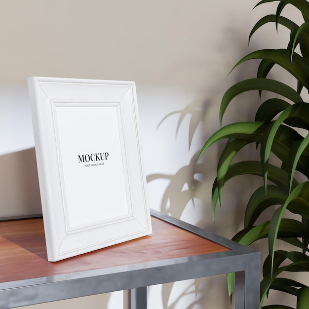 PSD little frame mockup template on the wooden console table with plant decoration for your family photo