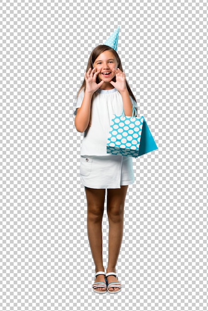 PSD little girl at a birthday party holding a gift bag shouting with mouth wide open