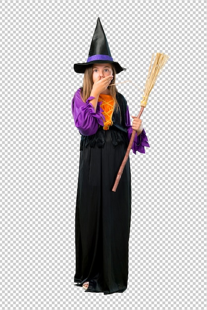 Little girl dressed as a witch for halloween holidays covering mouth with hands