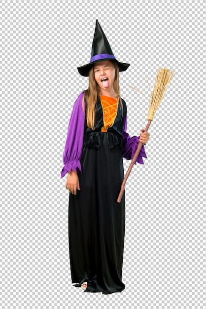 PSD bambina vestita come una strega per le feste di halloween che mostra la lingua alla macchina fotografica che ha sguardo divertente