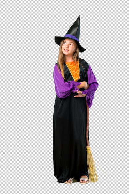 PSD little girl dressed as a witch for halloween holidays stand and looking up