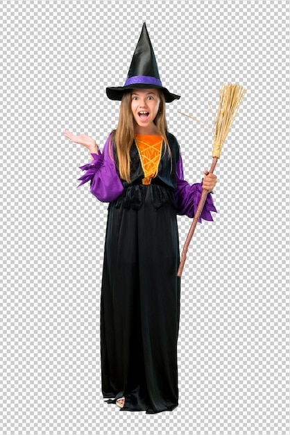 PSD little girl dressed as a witch for halloween holidays with surprise and shocked facial expression