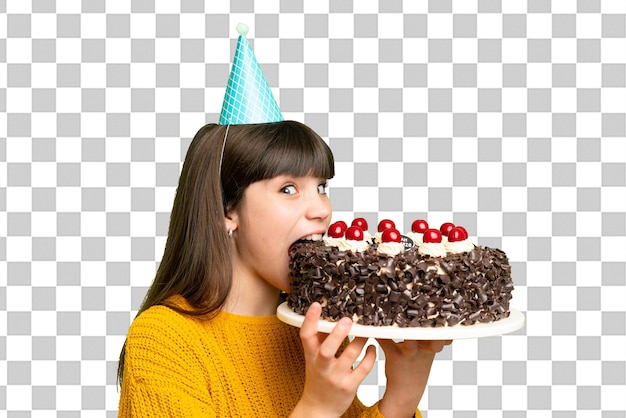 고립 된 크로마 키 배경 위에 생일 케이크를 들고 있는 작은 소녀