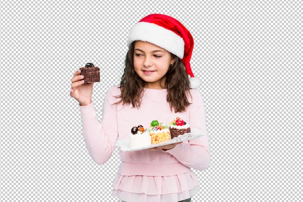 PSD little girl holding sweets celebrating christmas day