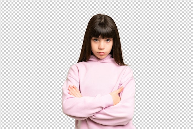 Little girl over isolated green chroma key background feeling upset