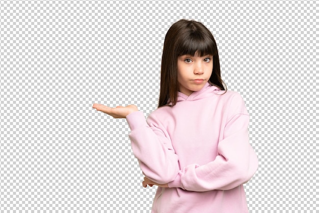 Little girl over isolated green chroma key background having doubts