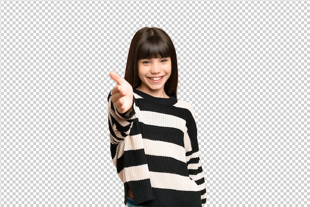 Little girl over isolated green chroma key background shaking hands for closing a good deal