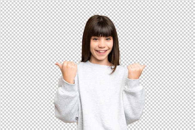 Little girl over isolated green chroma key background with thumbs up gesture and smiling