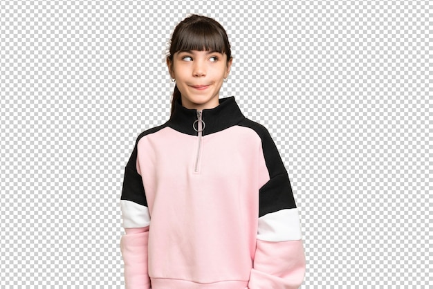 little girl over isolated green chroma key background making doubts gesture looking side
