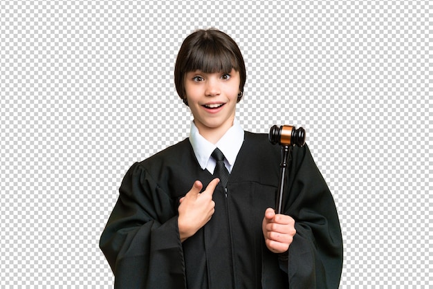 Little girl playing as a Judge over isolated background with surprise facial expression