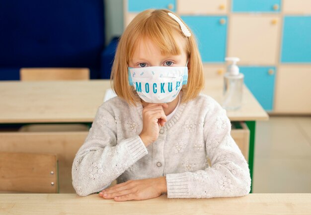 PSD little girl wearing a medical mask mock-up