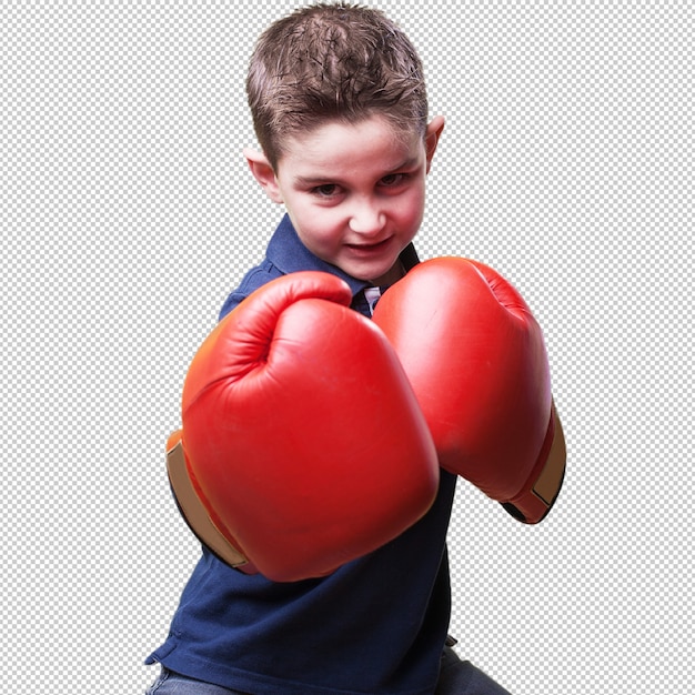 Little kid fighting with red boxing gloves