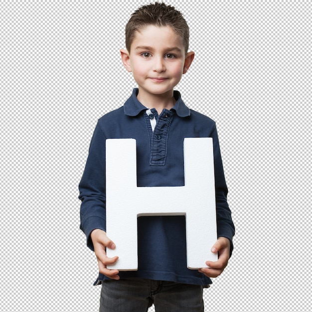 Little kid holding the h letter