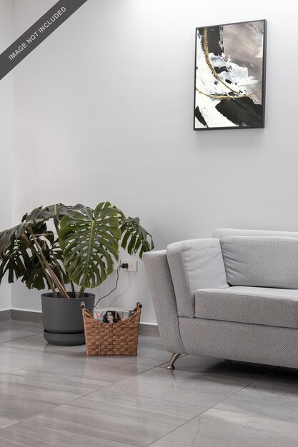 PSD living room wall frame mockup with sofa set and plants