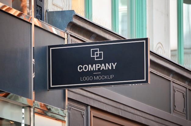 PSD logo branding mockup. outside store sign, rectangular shape