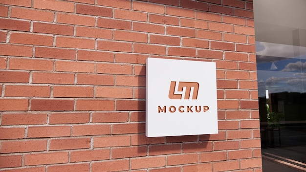 Logo mock up modern white hanging sign on the wall