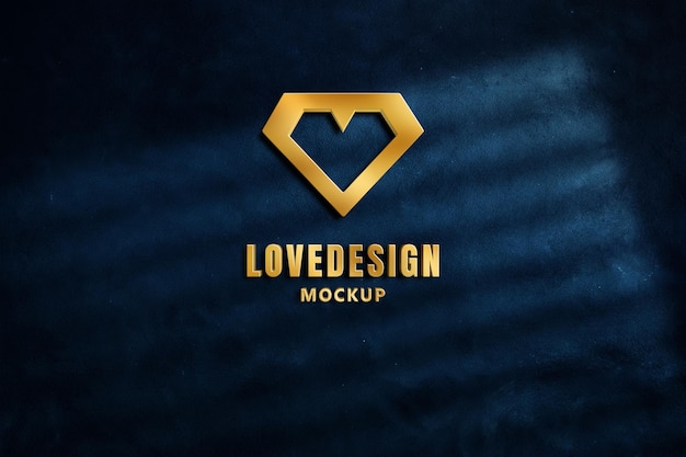 Logo mockup 3d golden metal with embossed style on dark blue concrete wall.