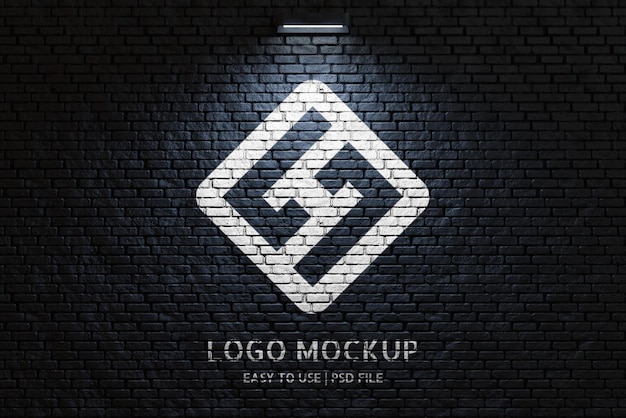 PSD logo mockup on black brick wall