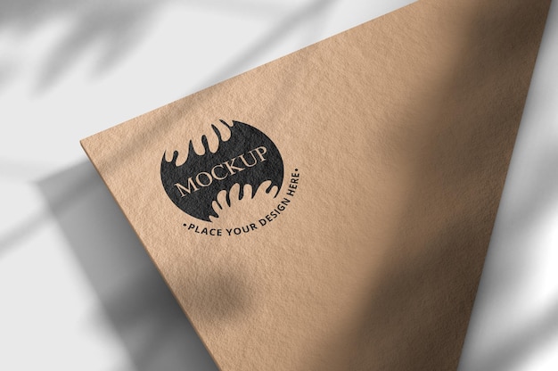 PSD logo mockup on business card with overlay shadow