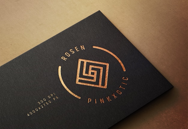 PSD logo mockup on business card with pressed gold print effect
