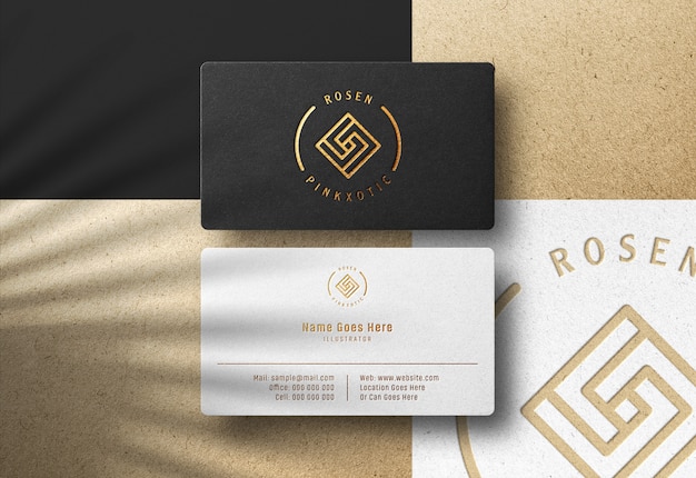 PSD logo mockup on business card with pressed gold print effect