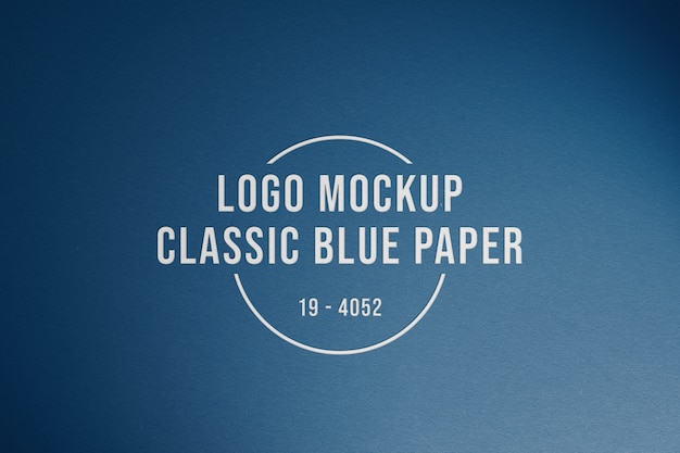 PSD logo mockup on classic blue paper