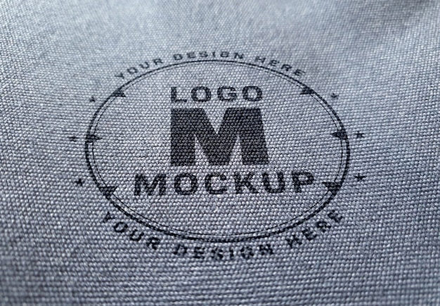 Logo mockup on denim fabric texture