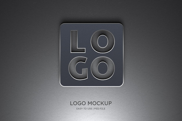 PSD mockup di logo sul muro grigio