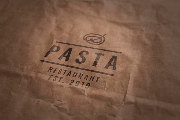 Logo mockup on kraft paper stamp effect