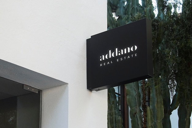 Logo Mockup Modern Black Sign with Plants