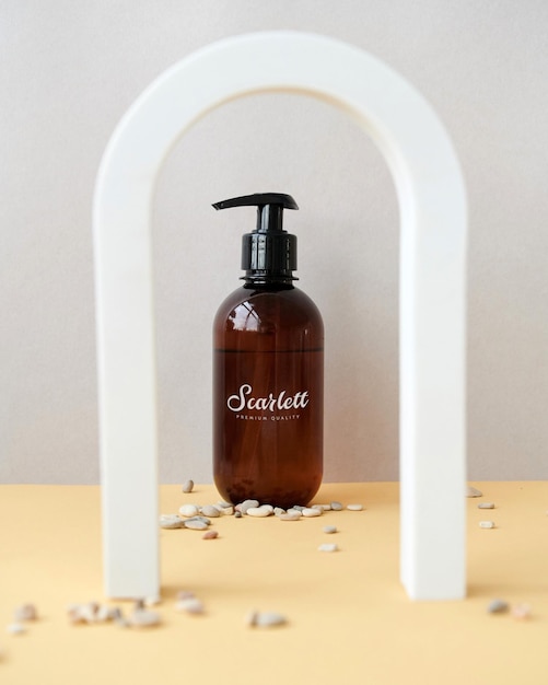 PSD logo mockup on a shampoo bottle