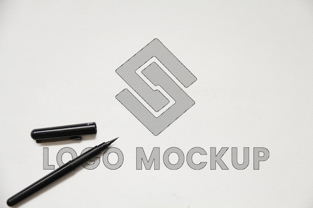 Logo mockup Sketch logo mockup design sketch logo mock on sketch book with pencil sketch psd mockup