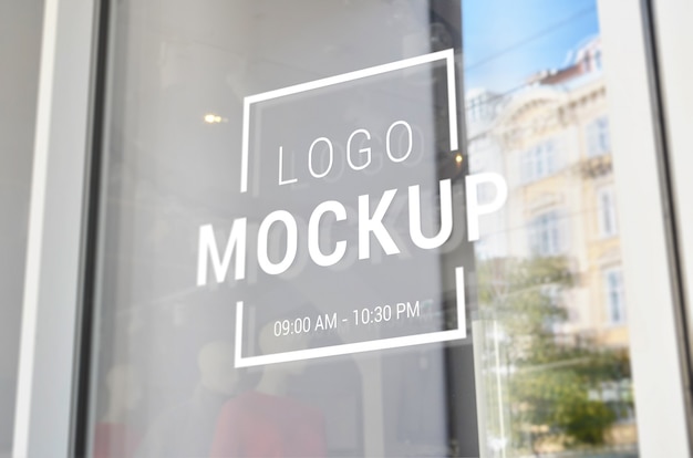 Logo mockup on store front door window