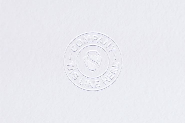 PSD logo mockup with embossed effect on white paper