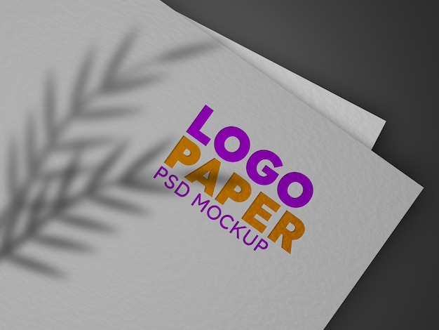 PSD logo paper mockup with leaf shadow