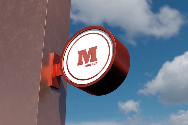 Logo sign mockup modern circular round signage in the exterior with blue sky