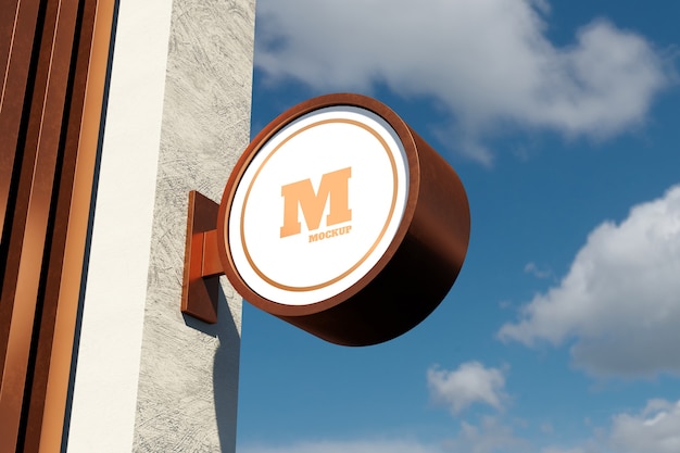 Logo sign mockup modern circular round signage in the exterior with blue sky