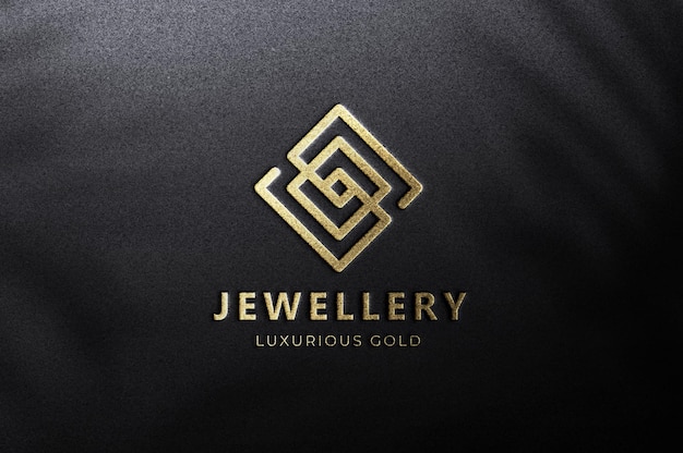 Luxe goud verijdeld logo mockup op zwarte achtergrond