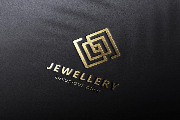 PSD luxe gouden verijdelde logo-mockup op zwart karton