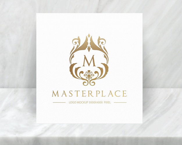 Luxe logo mockup met marmeren achtergrond