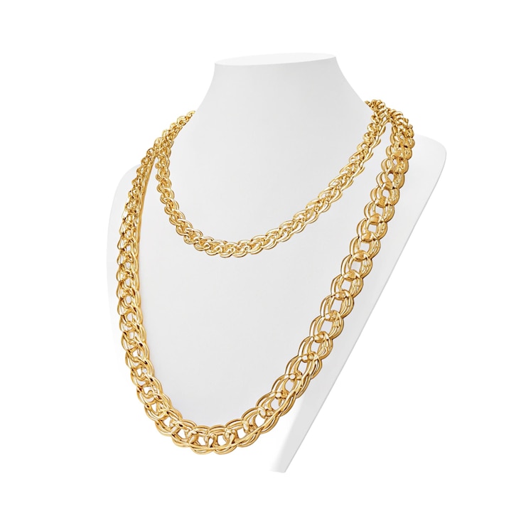 PSD a luxurious gold necklace is displayed in an elegant jewelry store showcasing its intricate design