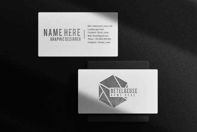 PSD luxury black embossed business card top view mockup