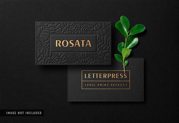 Luxury business card mockup with gold letterpress effect