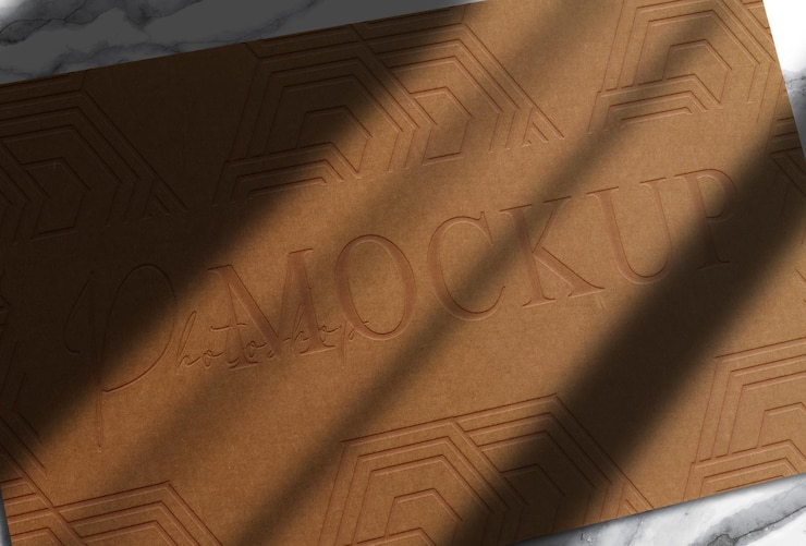 PSD luxury close up brown paper embossed logo single business card mockup
