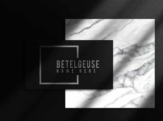 luxury close up silver embossed logo single business card mockup top view with marble podium