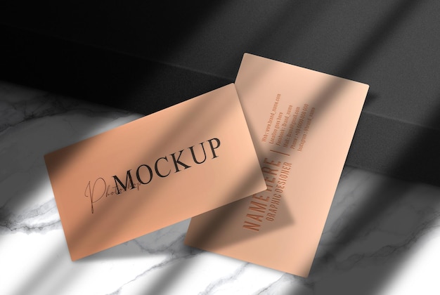 Luxury embossed business card with black podium mockup